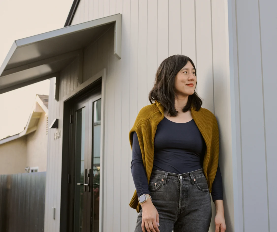 Elaine outside her one bedroom Backyard