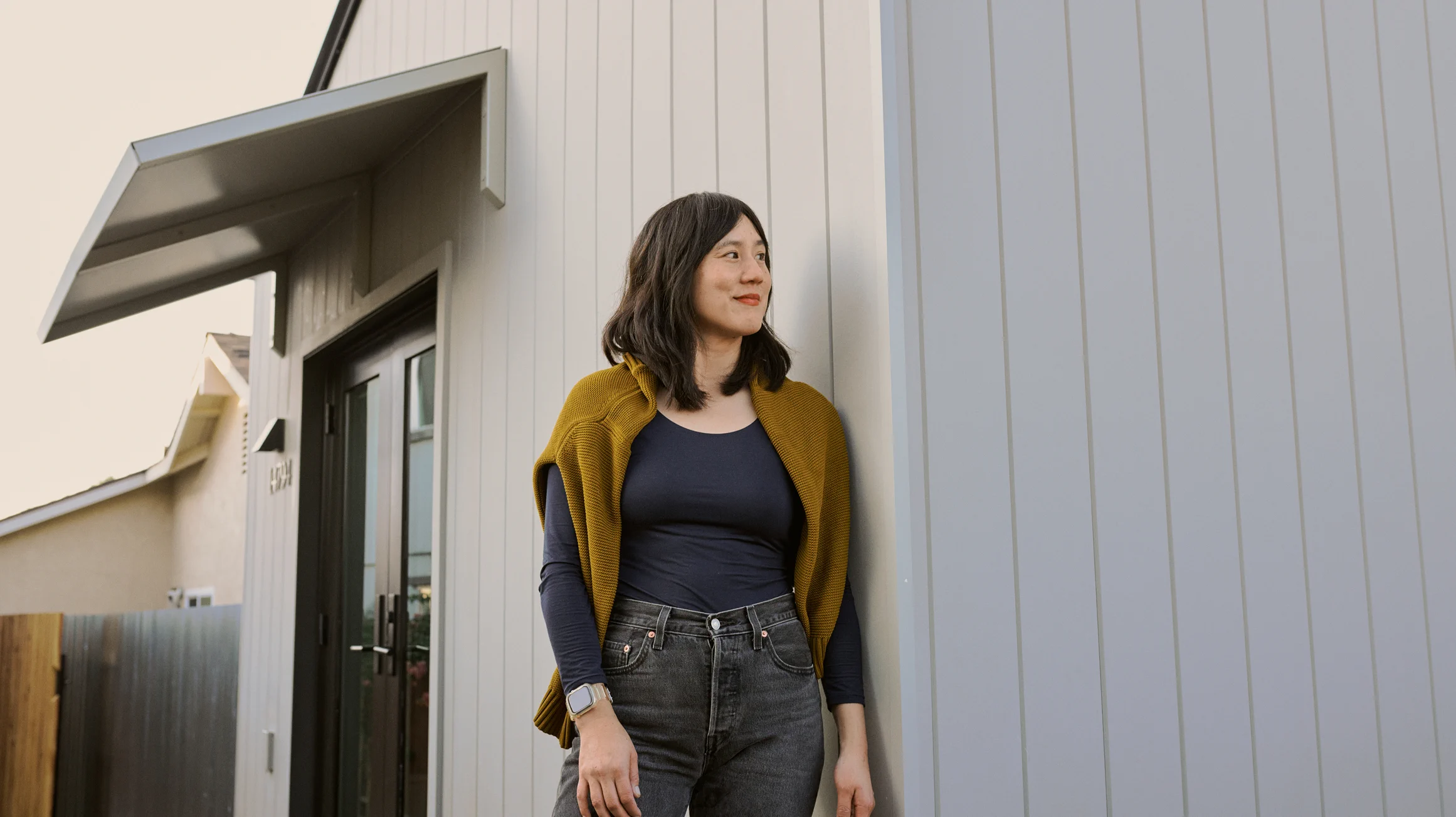 Elaine outside her one bedroom Backyard